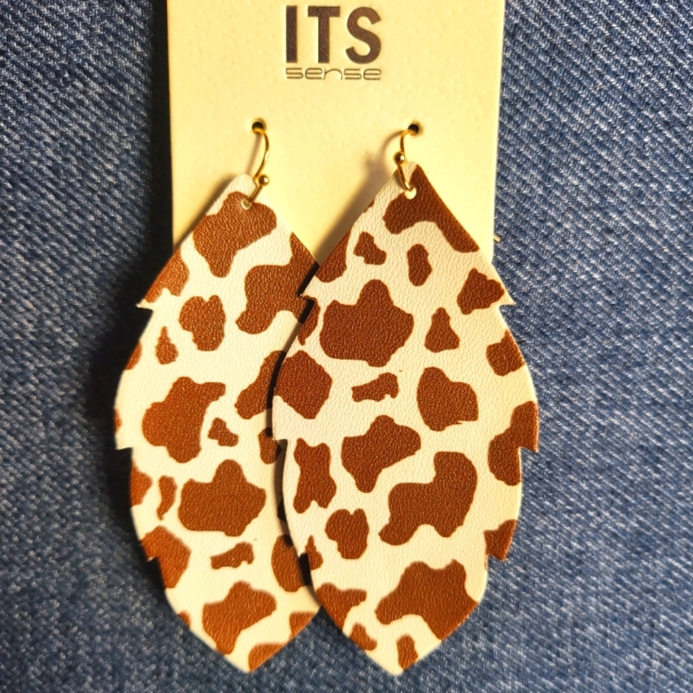 Thin lightweight dangle earrings. Cow or hide print. New